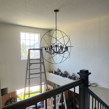 Russell Flood Electric - Orb hung from ceiling. - Electricians Near Me