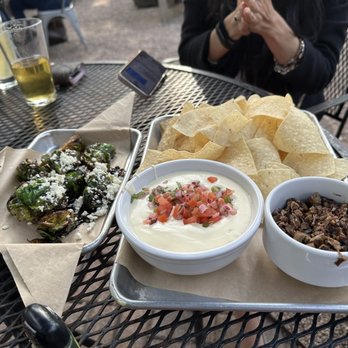 Piggy's Kitchen & Bar - Crispy Brussel Sprouts and Chips & Queso - Breakfast & Brunch Near Me - Houston, Texas Piggy's Kitchen & Bar - Crispy Brussel Sprouts and Chips & Queso - Breakfast & Brunch Near Me - Houston, Texas