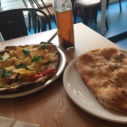 Nachos pizza, garlic bread and chili oil :) Nachos pizza, garlic bread and chili oil :)