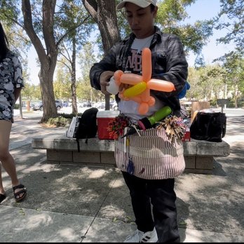 Twisties Balloons - Anthony, the balloon artist, is making Nemo and a fishing pole. - Party & Event Planning Near Me Twisties Balloons - Anthony, the balloon artist, is making Nemo and a fishing pole. - Party & Event Planning Near Me
