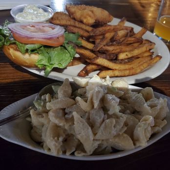 Packy's Pub - Fresh haddock sandwich with a side of fries and macaroni salad. - Pubs Near Me - Washington Mills, New York Packy's Pub - Fresh haddock sandwich with a side of fries and macaroni salad. - Pubs Near Me - Washington Mills, New York