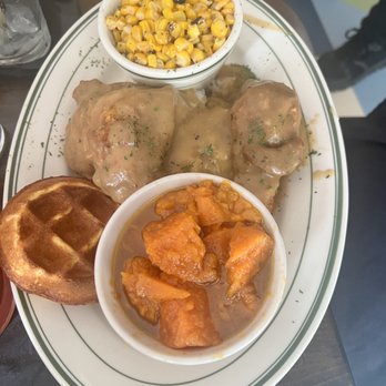 Taste Kitchen Bar - Smothered chicken over rice, yams, corn, cornbread waffle - Breakfast & Brunch Near Me - Houston, Texas Taste Kitchen Bar - Smothered chicken over rice, yams, corn, cornbread waffle - Breakfast & Brunch Near Me - Houston, Texas