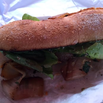 Paseo - A bit challenging to eat (the onions can make it messy) but really delicious! Tofu Delight. - Caribbean Near Me - Seattle, Washington