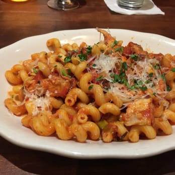 Mia Sorella - Friday night special - those spirally, hollow pasta noodles with chicken and a crushed tomato sauce. - Italian Near Me - Ballwin, Missouri Mia Sorella - Friday night special - those spirally, hollow pasta noodles with chicken and a crushed tomato sauce. - Italian Near Me - Ballwin, Missouri