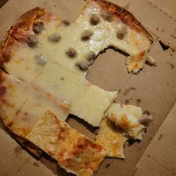 Half cheese half sausage thin crust pizza
