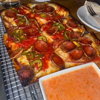 Emmy Squared Pizza - South End - Pepperoni, jalapeño, red onion pizza with a side of vodka sauce - Pizza Near Me - Charlotte, North Carolina Emmy Squared Pizza - South End - Pepperoni, jalapeño, red onion pizza with a side of vodka sauce - Pizza Near Me - Charlotte, North Carolina
