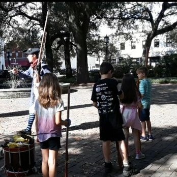 Liberty Encounters - Flag and wooden musket drill - Historical Tours Near Me