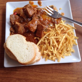 El Barrio - Roasted pork w/chips and bread. Very tender and tastes great!! - Spanish Near Me - Rota, California El Barrio - Roasted pork w/chips and bread. Very tender and tastes great!! - Spanish Near Me - Rota, California