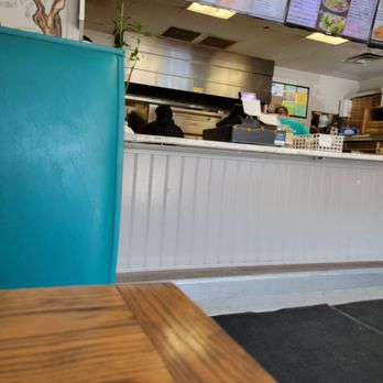 Famous Pizza - a view of a restaurant counter - Pizza Near Me - Tiverton, Rhode Island