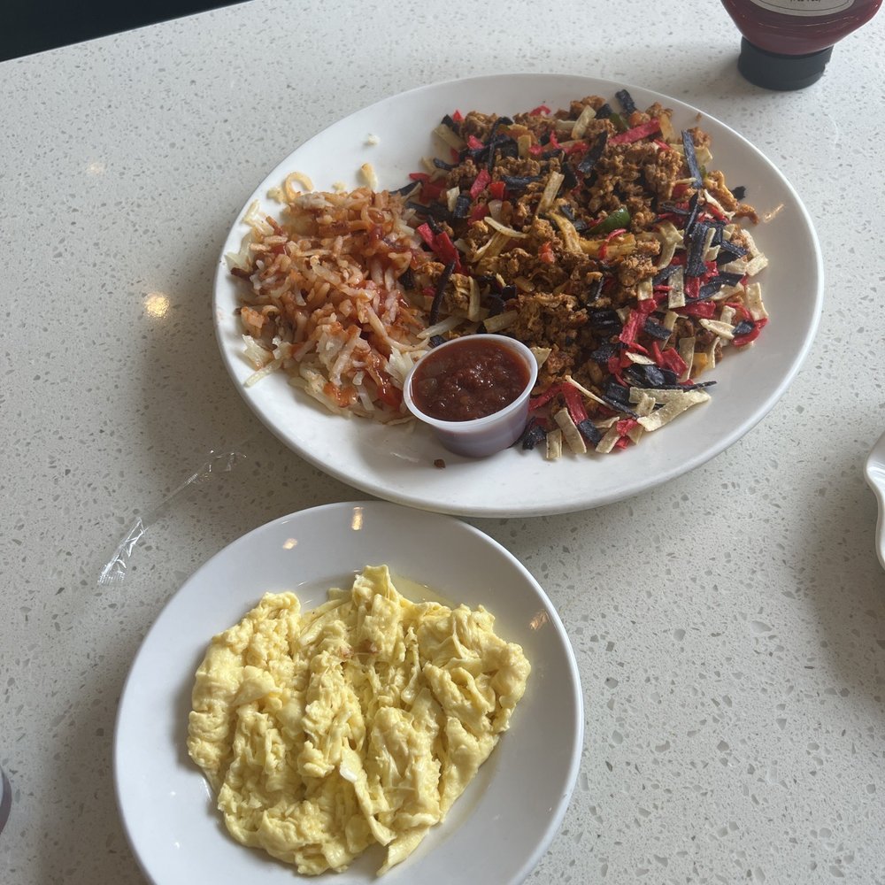 Eggsquisite Cafe - Migas with WAY too much chorizo and no eggs. Eggs on the side. - Breakfast & Brunch Near Me - Frisco, Texas