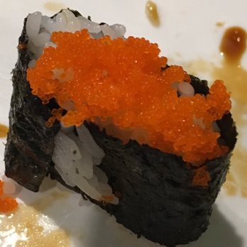 Arigato - This is exactly the piece of tobiko sushi that I was served! Don't mind the soy sauce, that was my fault. But the tobiko was spread so thin. - Sushi Bars Near Me - Edgewater, New Jersey Arigato - This is exactly the piece of tobiko sushi that I was served! Don't mind the soy sauce, that was my fault. But the tobiko was spread so thin. - Sushi Bars Near Me - Edgewater, New Jersey