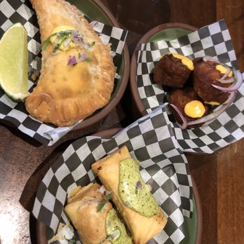 Tanta - Empanada de tamal (top left), boliyucas (top right), and tequenos de pollo (bottom) - Peruvian Near Me - Chicago, Illinois