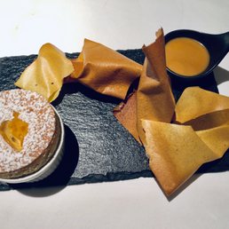 Durian & Vanilla Soufflé with salted caramel and durian flavored wafers.