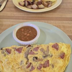 Kielbasa, onion, mushrooms omelet and a spinach, black olive omelet