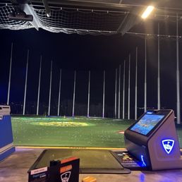 a view of a golf course at night