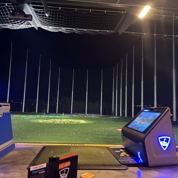 Topgolf - a view of a golf course at night - Golf Near Me - Little Rock, Arkansas
