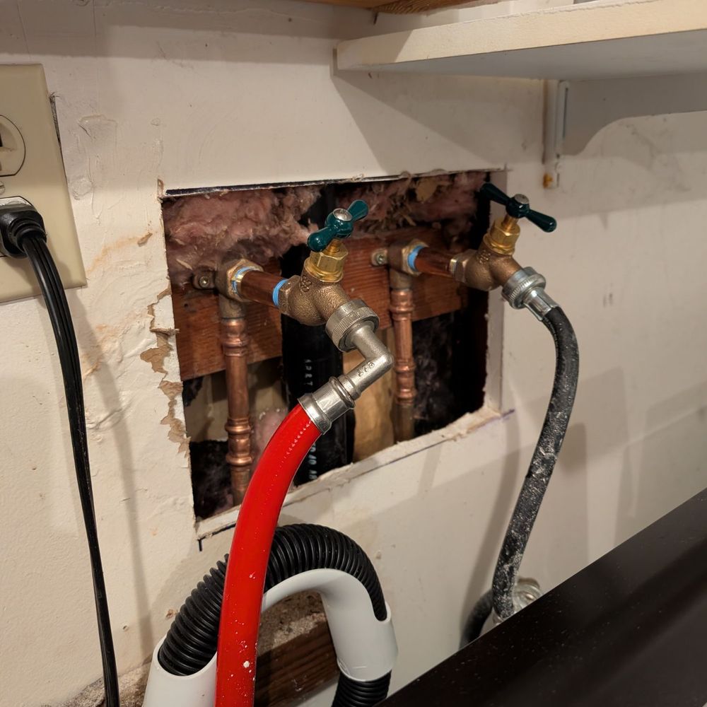 After spigots were replaced (had to cut away drywall because it was in bad shape) After spigots were replaced (had to cut away drywall because it was in bad shape)