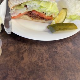 a sandwich and pickles a sandwich and pickles