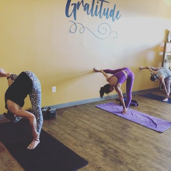 New Moon Hot Yoga - Fun yoga against the wall - Yoga Near Me - Clarksboro, New Jersey