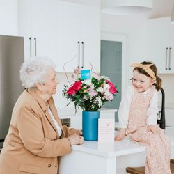Callia Flowers - Callia bouquet in vase next to customers