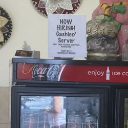 Please hire a friendly cashier/server.