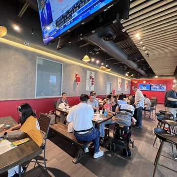 AMA Kitchen - people sitting at tables in a restaurant - Asian Fusion Near Me - Katy, Texas AMA Kitchen - people sitting at tables in a restaurant - Asian Fusion Near Me - Katy, Texas