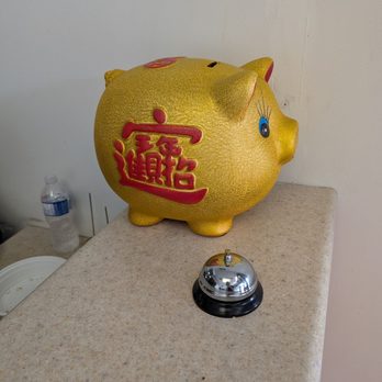 China China Place - Piggy bank and bell - Chinese Near Me - Mississauga, Ontario