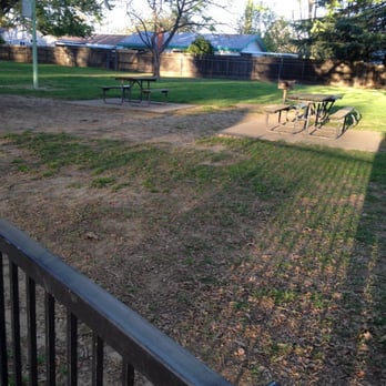 Oki Park - Picnic table on the side of playground. - Parks Near Me - Sacramento, California