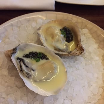 Uchiko Austin - Omakase #1: oyster with butter cream and osetra caviar. - Sushi Bars Near Me - Austin, Texas