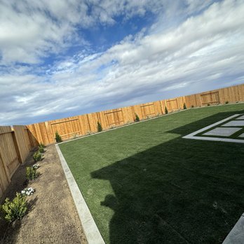 Millan Landscape - a backyard with grass and a fence - Landscaping Near Me - Bakersfield, California Millan Landscape - a backyard with grass and a fence - Landscaping Near Me - Bakersfield, California