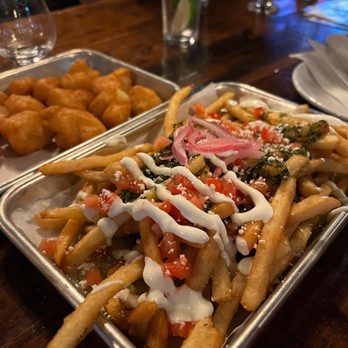 12 West Brewing - Downtown Mesa - Chimichurri fried & in the background Cauliflower bites - Cocktail Bars Near Me - Mesa, Arizona 12 West Brewing - Downtown Mesa - Chimichurri fried & in the background Cauliflower bites - Cocktail Bars Near Me - Mesa, Arizona