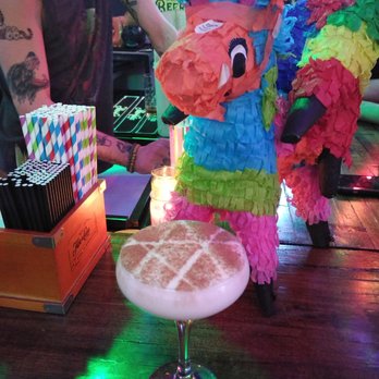 The Electric Cure - Dolce & Banana (a delightful mix of rums with a cinnamon pentagram) - Tiki Bars Near Me - Edgewater, Colorado The Electric Cure - Dolce & Banana (a delightful mix of rums with a cinnamon pentagram) - Tiki Bars Near Me - Edgewater, Colorado