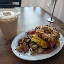 Breakfast bagel + iced vanilla latte Breakfast bagel + iced vanilla latte
