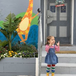 Happy kid at the front door