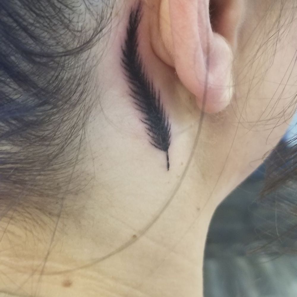 Massive Tattoo Studio - My "Liberating behind the ear, Feather tattoo. I will enjoy this beauty for the rest of me life!  Derek did this one! - Tattoo Near Me - Las Vegas, Nevada