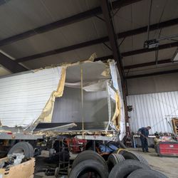 Reliable Truck Repair & Tire Service - Lots of truck trailers like this.