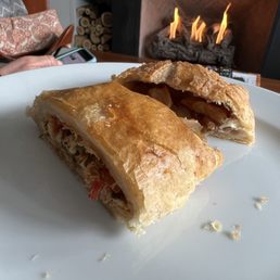 Half of a chicken chipotle empanada and half of an apple empanada. Both were delicious!!