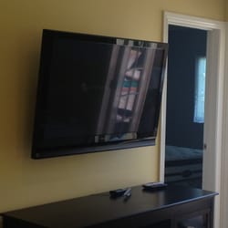 Will Help U - 42" SmartTV mounted in bedroom with concealed wiring/cables.