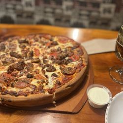 Moosejaw Pizza & Dells Brewing - Large Pan Crust Cheesy Meatlovers 14" with the Whiskey Sour brew and the Moose Buffalo BI Wings