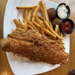 Fried Catfish fillet. Cajun Fries Fried Catfish fillet. Cajun Fries