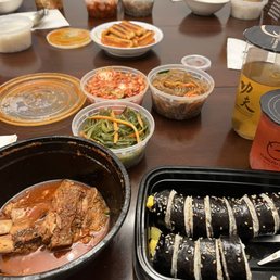 a table full of food and drinks