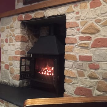 Esplanade Bar & Restaurant - Wood burner in the back bar - British Near Me - Bangor, DOW