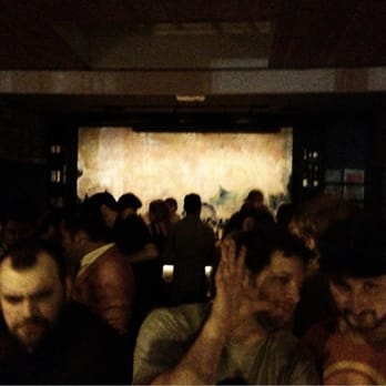 The Exley - a large group of people in a dark room - Cocktail Bars Near Me - Brooklyn, New York The Exley - a large group of people in a dark room - Cocktail Bars Near Me - Brooklyn, New York
