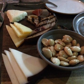 Mita's Restaurant and Bar - Queso fresco, Mahon, Drunken Goat cheese board with toasted fruit bread, quince, and marcona almonds. Quite delicious! - Spanish Near Me - Cincinnati, Ohio Mita's Restaurant and Bar - Queso fresco, Mahon, Drunken Goat cheese board with toasted fruit bread, quince, and marcona almonds. Quite delicious! - Spanish Near Me - Cincinnati, Ohio