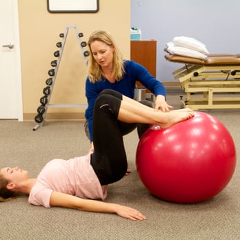 TAG Physical Therapy - Katie working one-on-one with a patient - Physical Therapy Near Me - Redondo Beach, California TAG Physical Therapy - Katie working one-on-one with a patient - Physical Therapy Near Me - Redondo Beach, California