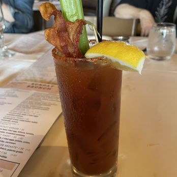Bayside Restaurant - The Spicy Southern Bloody Mary ($16): loaded with crispy bacon, olives, and a giant celery stalk...a meal in itself. - New American Near Me - Newport Beach, California