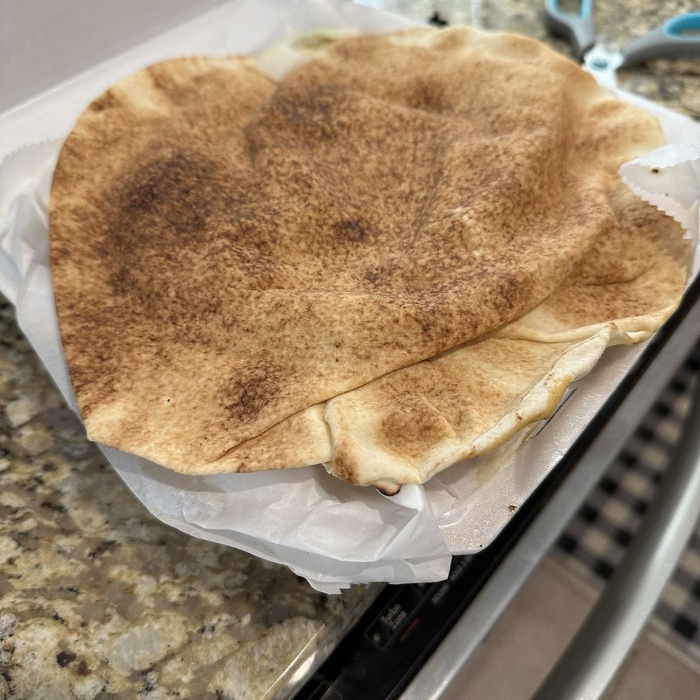 Pita bread on our mixed grill ordered without gluten. Pita bread on our mixed grill ordered without gluten.