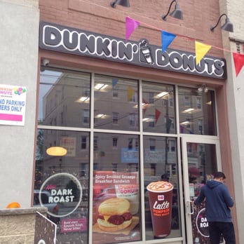 Dunkin' - a man standing outside a dunkin donuts store - Coffee & Tea Near Me - Philadelphia, Pennsylvania Dunkin' - a man standing outside a dunkin donuts store - Coffee & Tea Near Me - Philadelphia, Pennsylvania