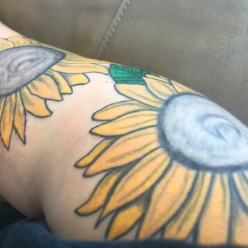 Dominant Ink - Couldn't even color in the lines? Yellow on the outside of the flower. What a joke. - Piercing Near Me - Redding, California