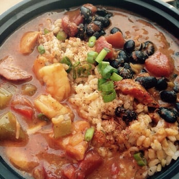 Roux Dat - Half chicken sausage shrimp jambalaya, half crawfish étouffée, served with brown rice - Cajun/Creole Near Me - Capitola, California Roux Dat - Half chicken sausage shrimp jambalaya, half crawfish étouffée, served with brown rice - Cajun/Creole Near Me - Capitola, California